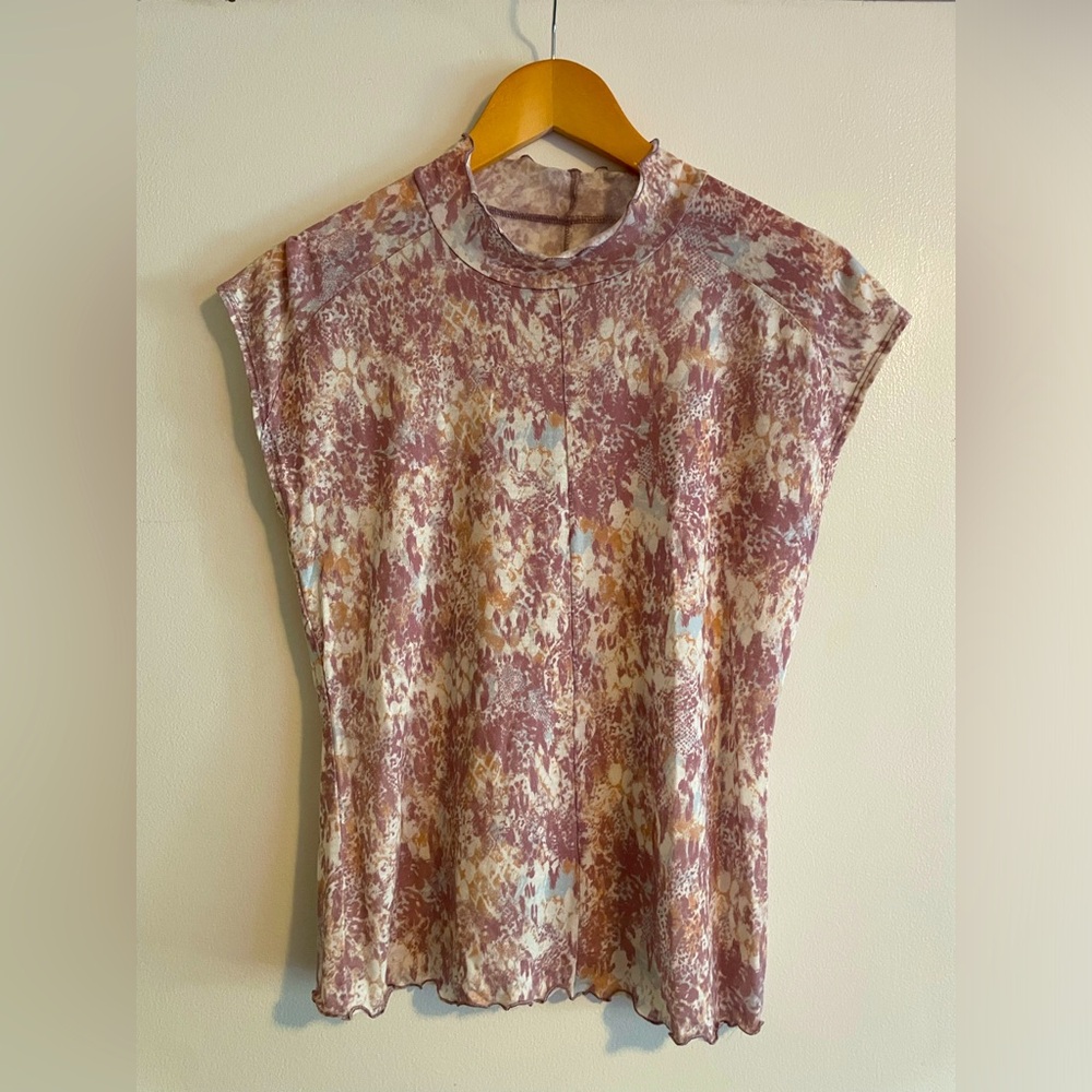 Mock neck tee by Free People.